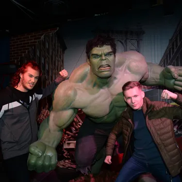 Guests next to Thor wax figure at Madame Tussauds Blackpool